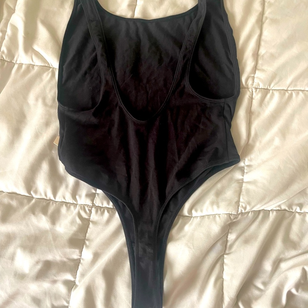 Skims cotton bodysuit. New with tags